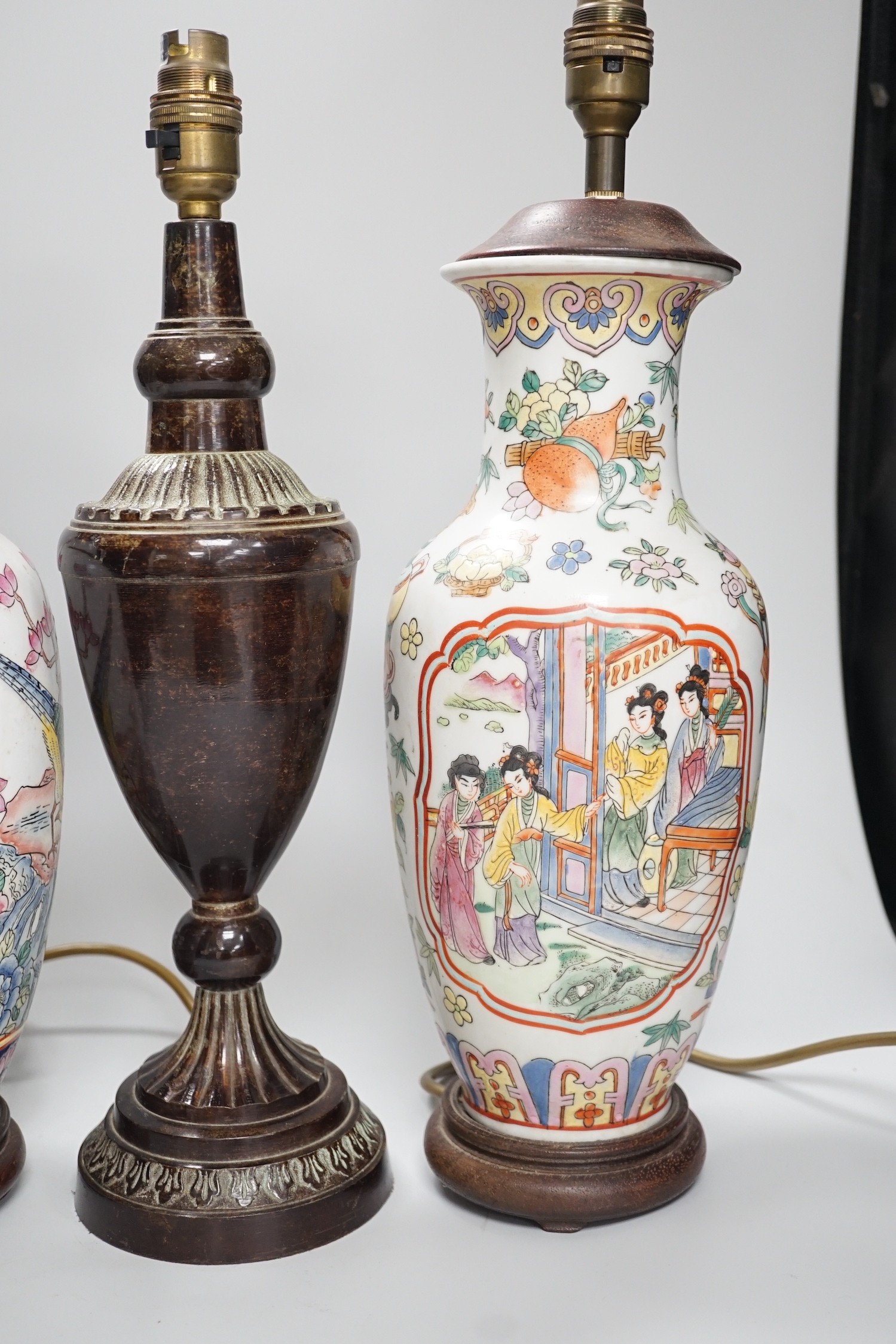 Two Chinese famille rose table lamps and one other